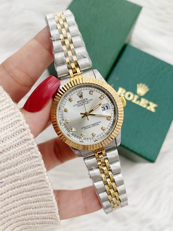 ساعة Rolex Lady-Datejust  شروط لون سيلفر_جولد ميناء سيلفر و اسود وجولد